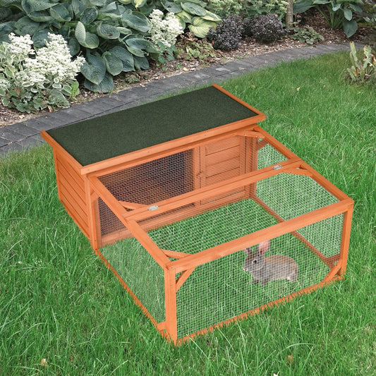PawHut Guinea Pigs Hutches with a small rabbit inside on a green lawn