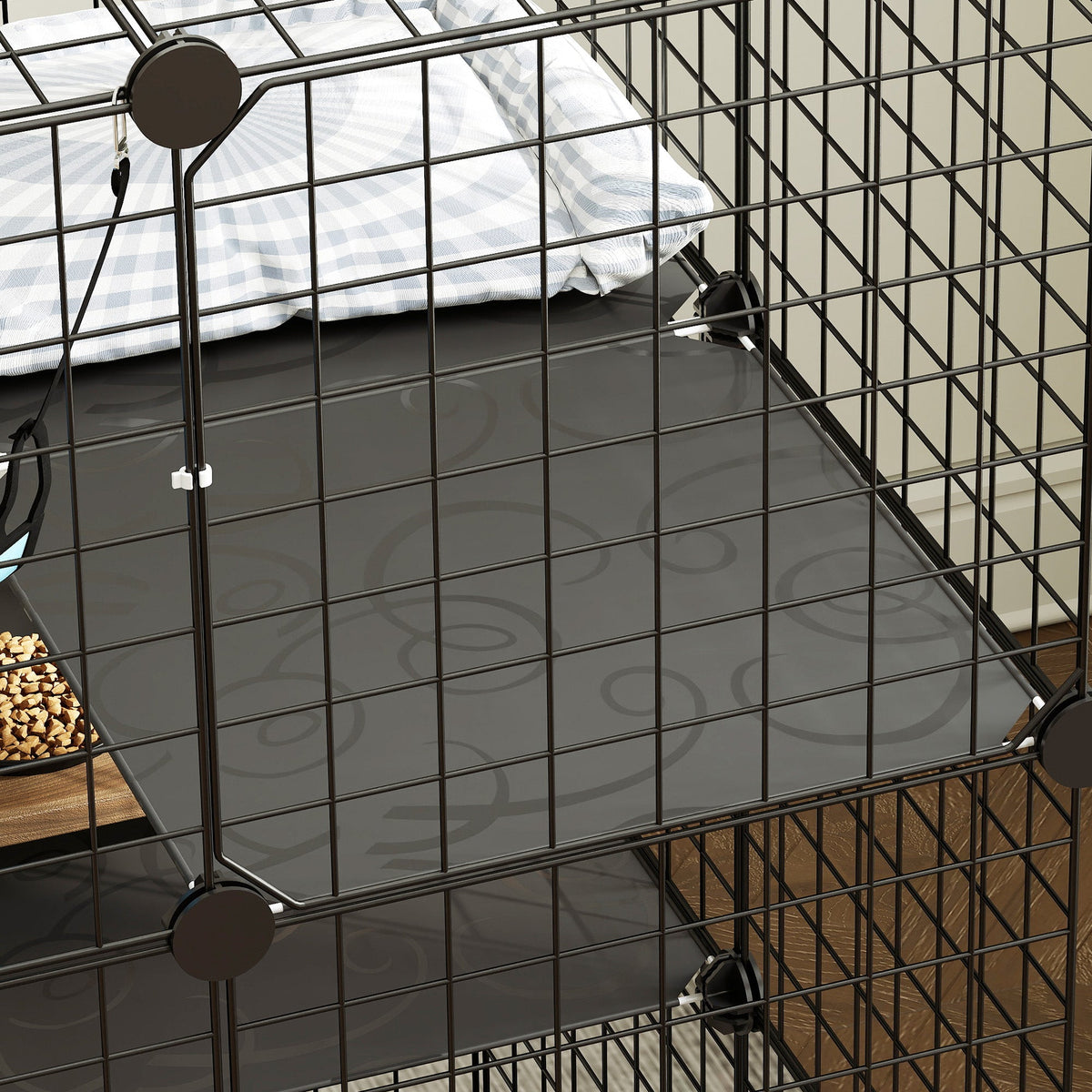 A close-up view of a platform inside the black 3-tier cat enclosure