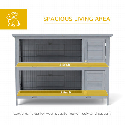 The spacious living area of the grey two-tier rabbit hutch is highlighted with text and icons