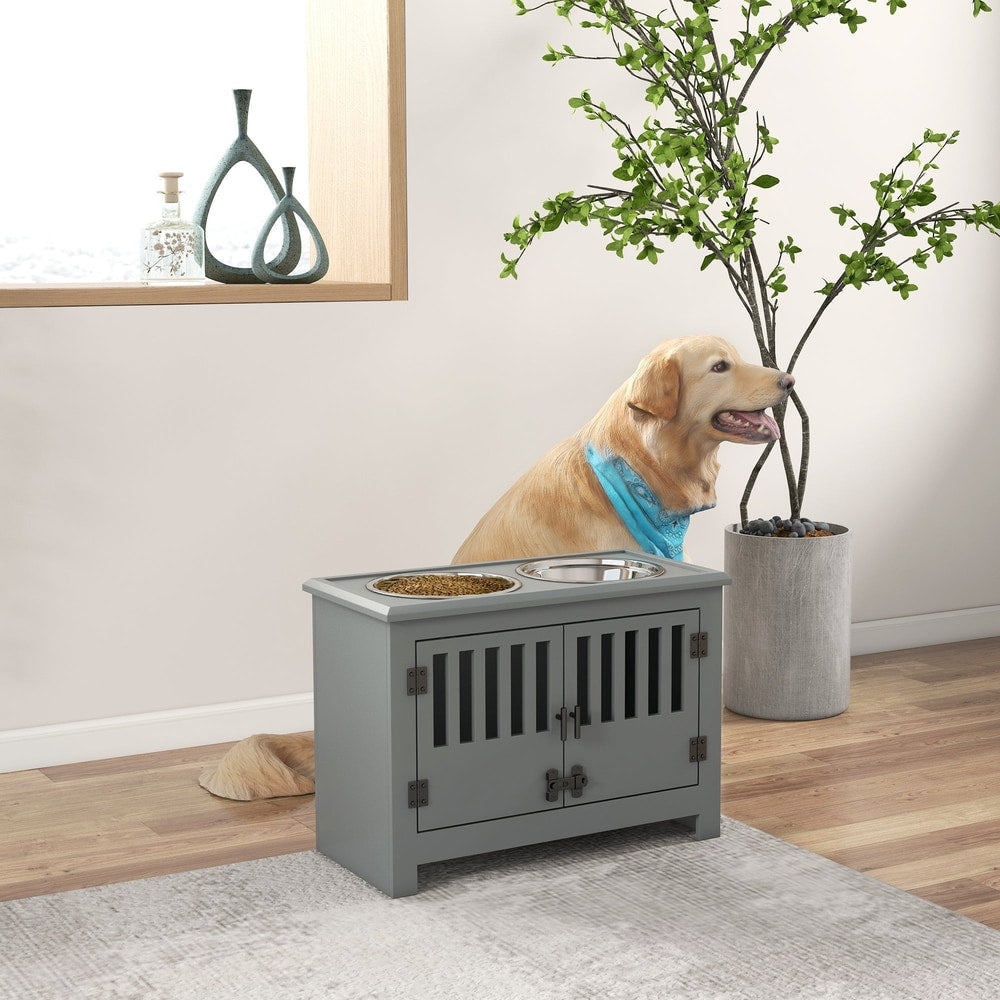 The grey pet feeding station with two bowls on top, shown in a room with a large dog wearing a blue bandana