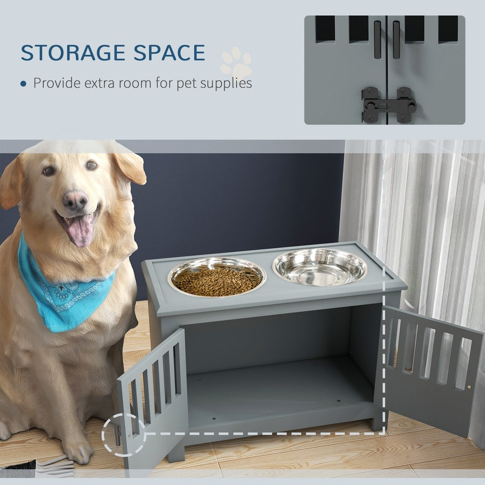 The grey pet feeding station with its doors open, revealing storage space inside and two bowls on top