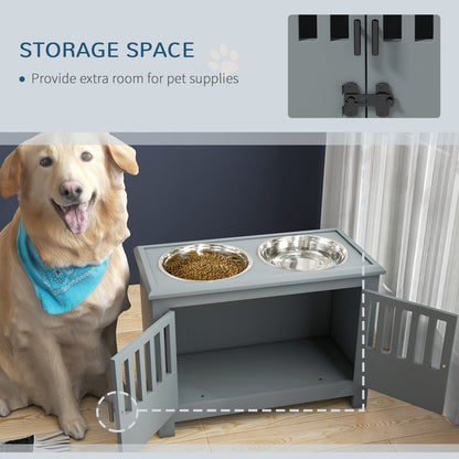 The grey pet feeding station with its doors open, revealing storage space inside and two bowls on top