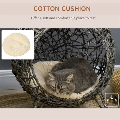 A close-up of the removable cream cushion for the ball-shaped cat house, showing its soft texture