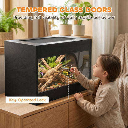 Child opening the tempered glass doors of the reptile vivarium