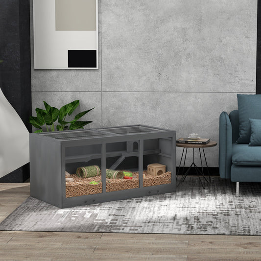 The hamster hutch in a modern living room setting with bedding and toys inside