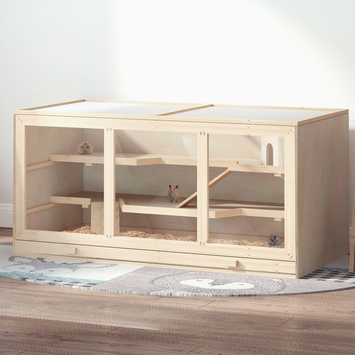 Wooden hamster hutch with tray and clear sides, set up on a rug indoors