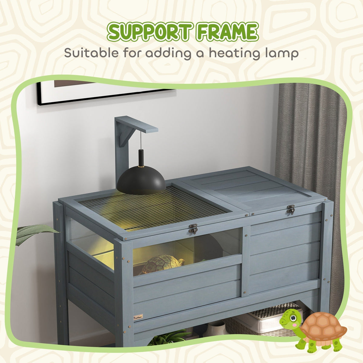A tortoise is inside the reptile house with a heating lamp above
