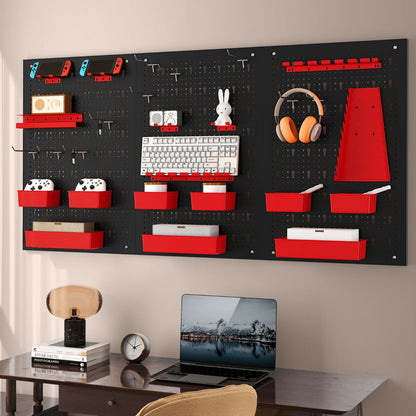 This pegboard wall organiser is set up in a home office with a laptop, headphones and gaming accessories