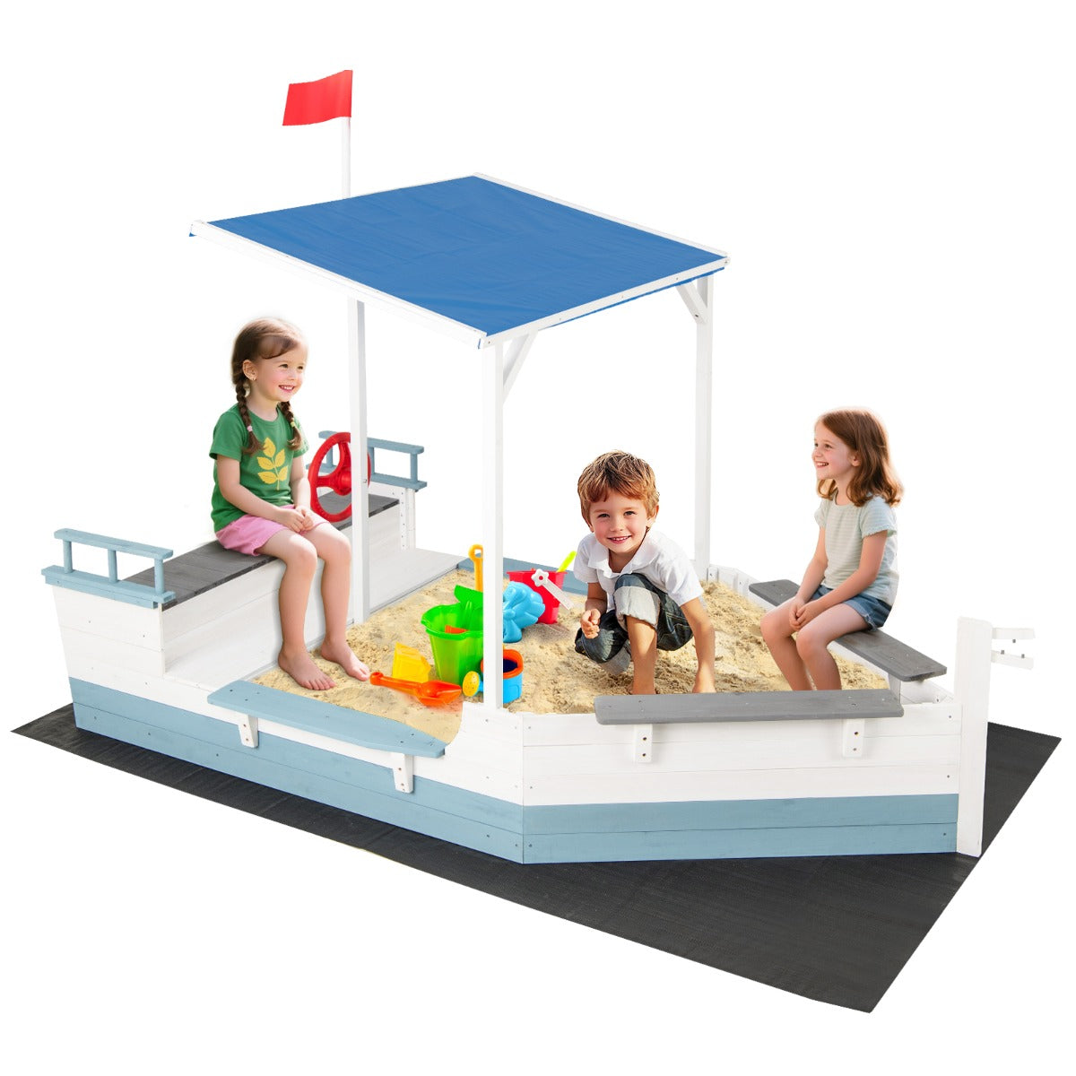 Pirate Ship Sandbox with canopy, flag and rudder, showing three children playing
