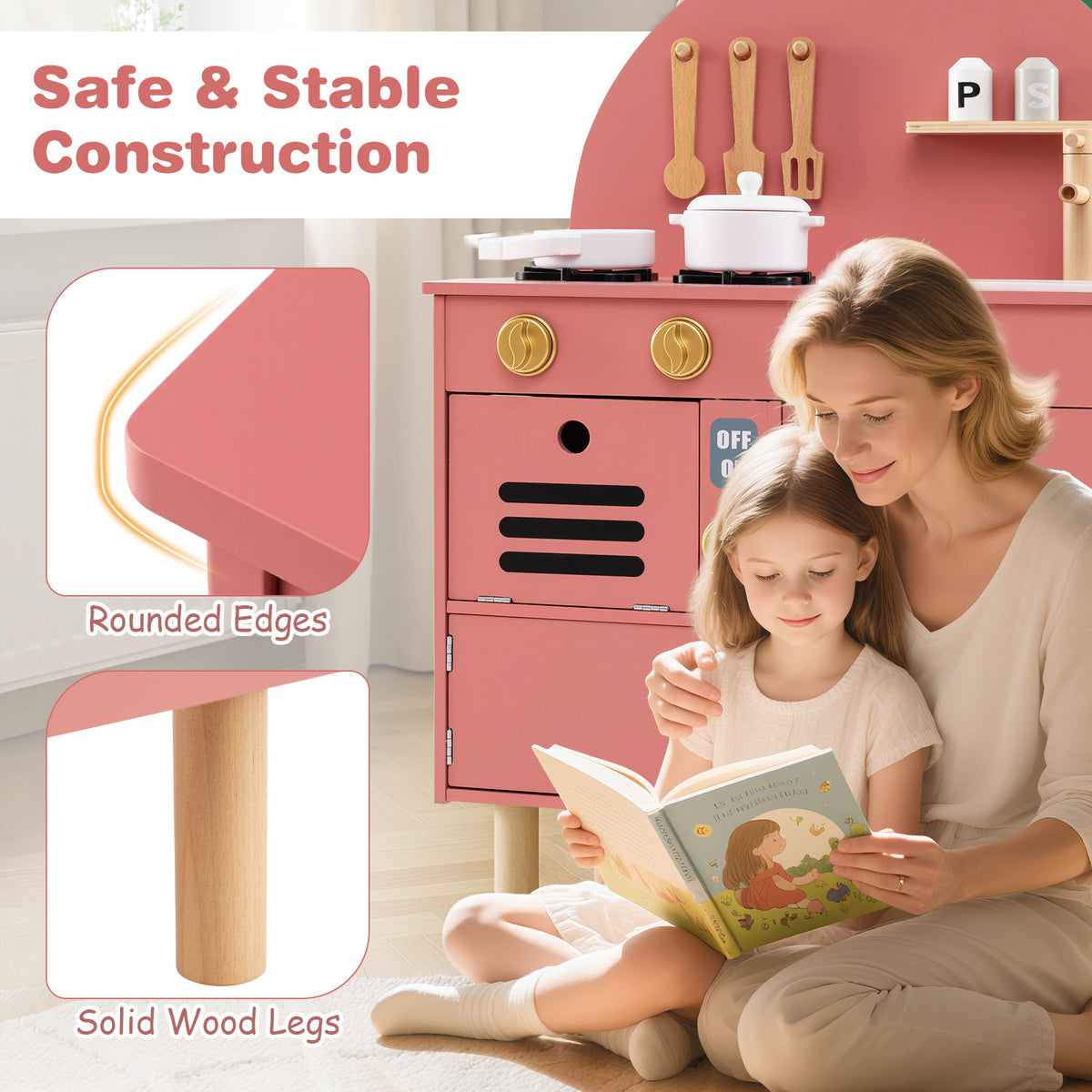 A mother and child read a book next to the safe and stable construction of the play kitchen set