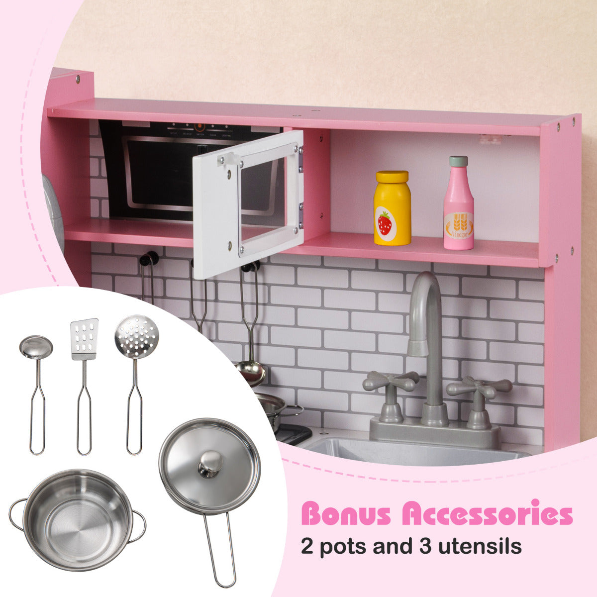 The play kitchen set with included metal pots and cooking utensils displayed