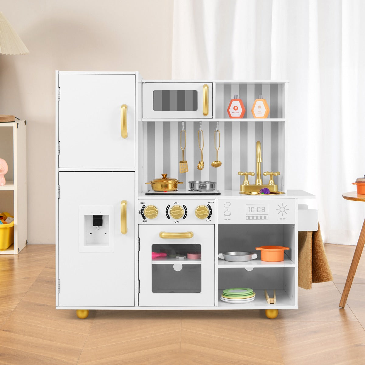 White play kitchen set with golden handles and accessories