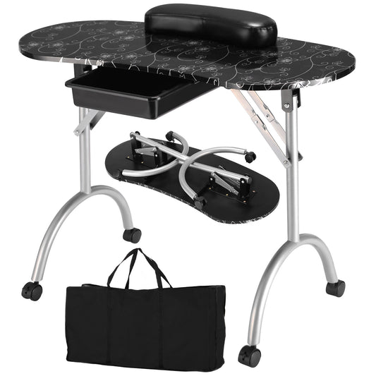 Portable Nail Table Station with black floral pattern top, silver legs and a black wrist pad