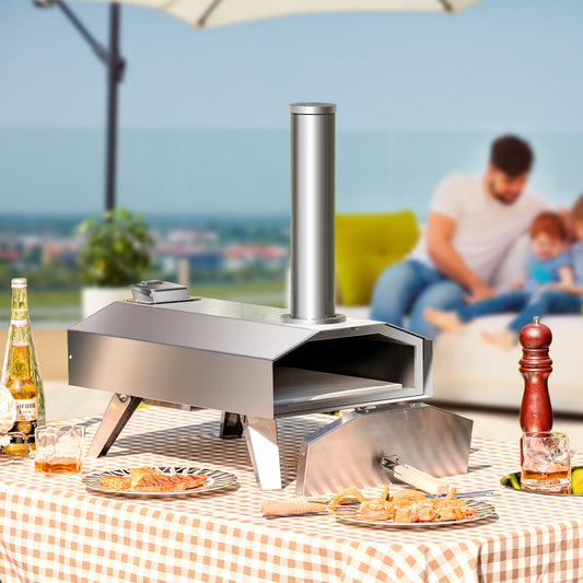 The stainless steel pizza oven sitting on a table with its door placed in front