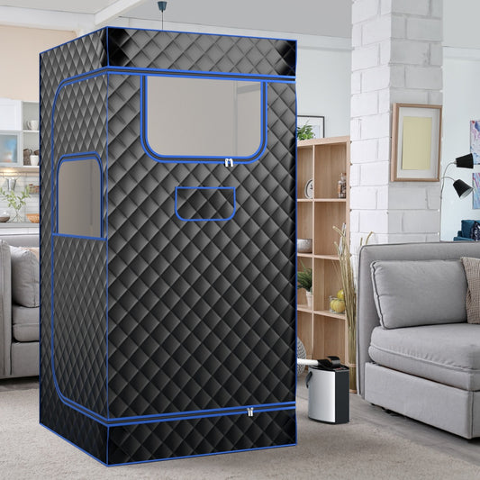 The portable steam sauna for home set up in a living room next to a sofa