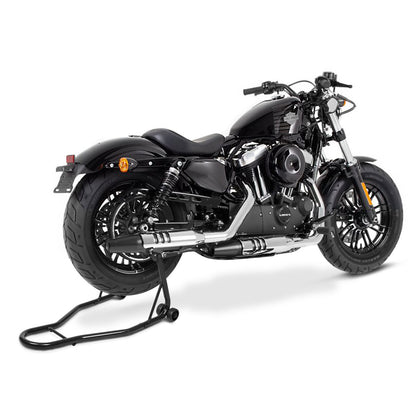 A black cruiser motorcycle is supported by the rear wheel lift stand