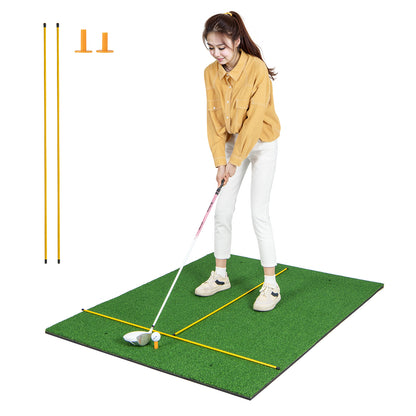 The golf practice mat with a woman standing on it while holding a golf club