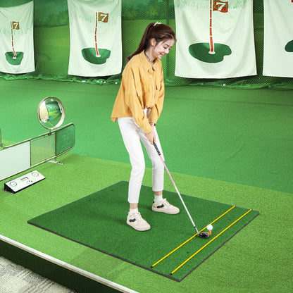 The golf practice mat being used by a woman in an indoor golf training facility