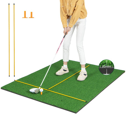 Premium Golf Practice Hitting Mat 3-In-1 with alignment sticks and golf tees on a white background