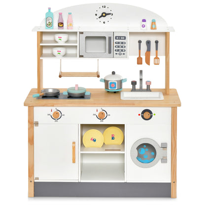 Close-up of the pretend kitchen set showing the hob, sink, microwave and oven controls
