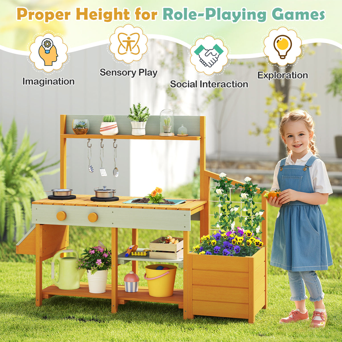 Girl standing next to the yellow mud kitchen play kitchen, highlighting role-playing features