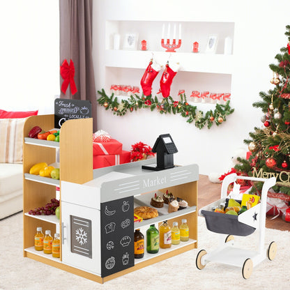 Toy grocery store and shopping cart in a festive room setting