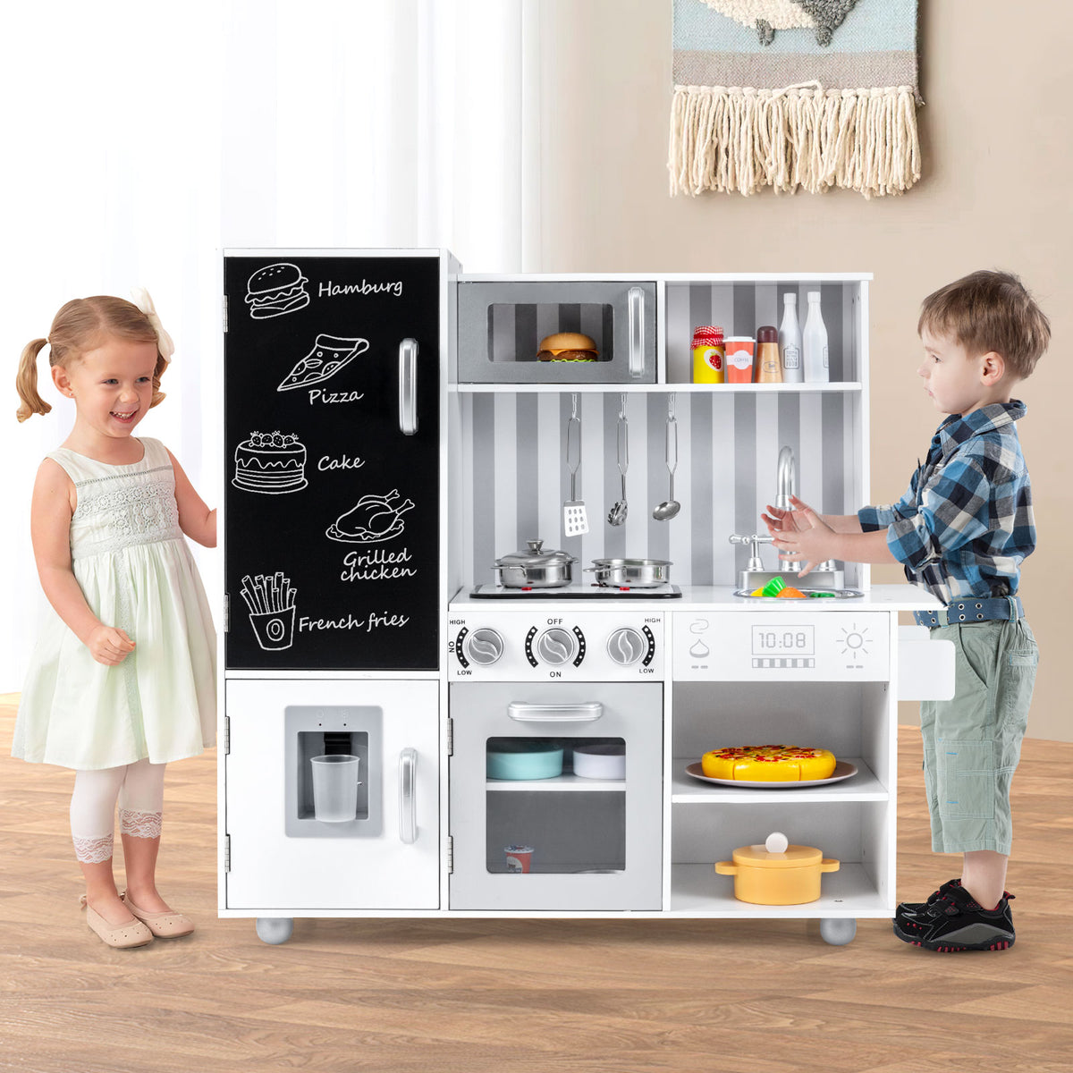 A young girl and boy playing together with the play kitchen set in a home environment