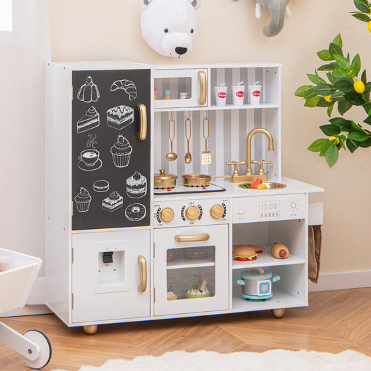 The white play kitchen with gold accents is shown in a child's room with toys and plants
