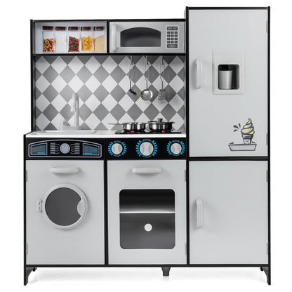 The play kitchen set showing the stove, microwave, and washing machine doors in a front view