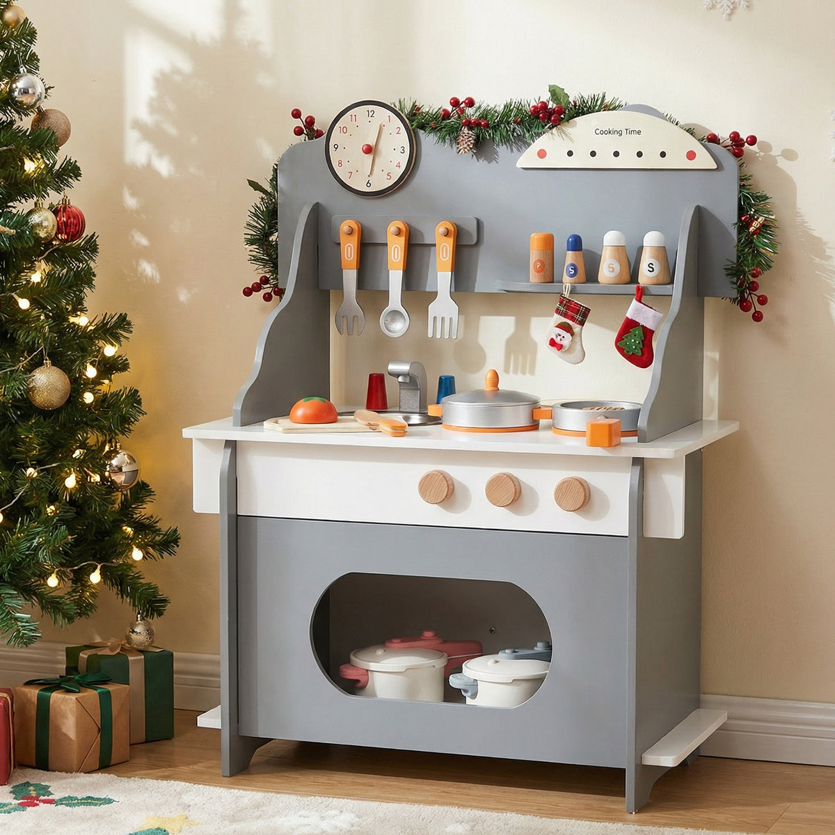 The grey toy kitchen set decorated for Christmas