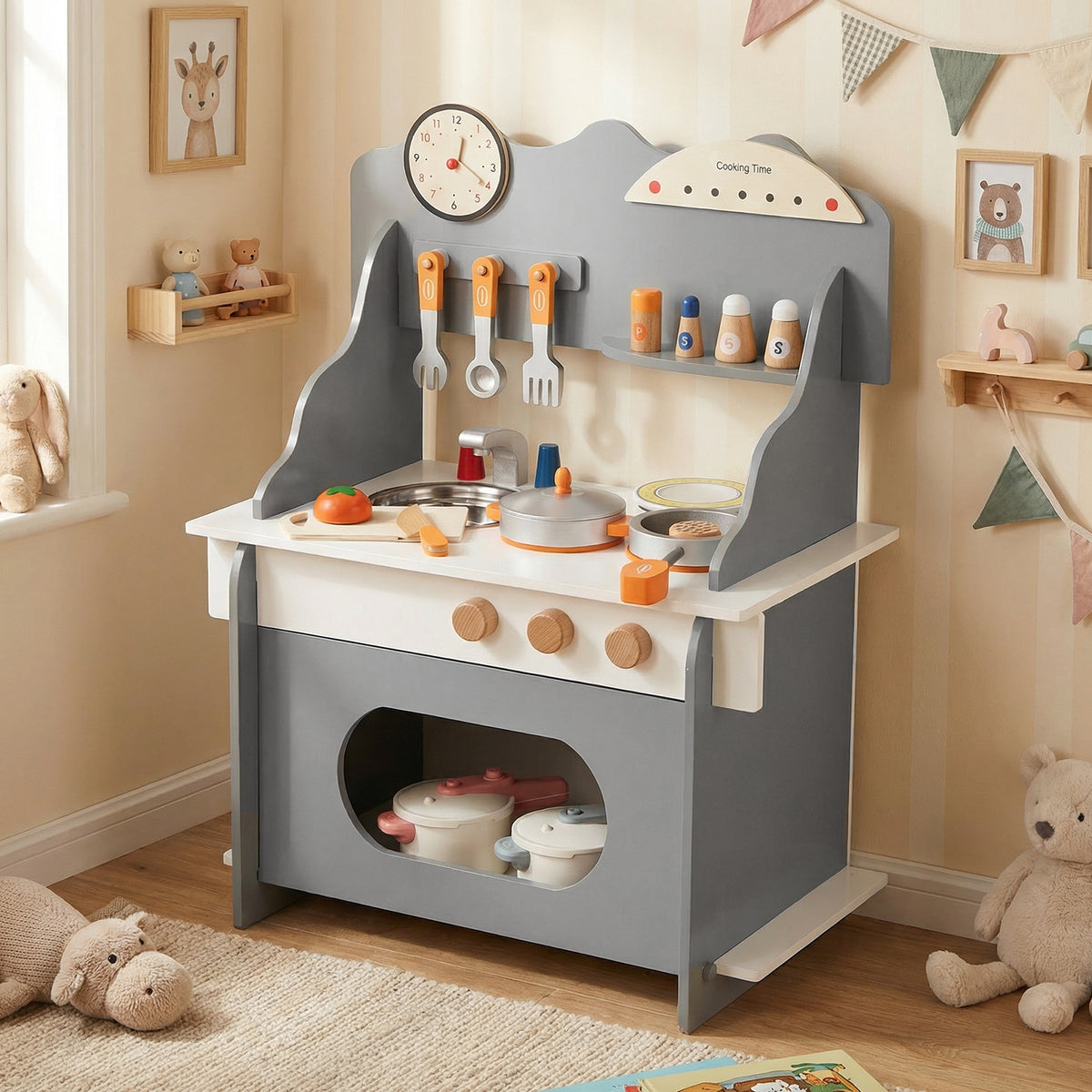 The grey play kitchen set is shown in a child's bedroom setting