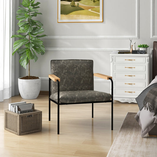 The accent chair placed in a bright bedroom next to a white chest of drawers and a potted plant