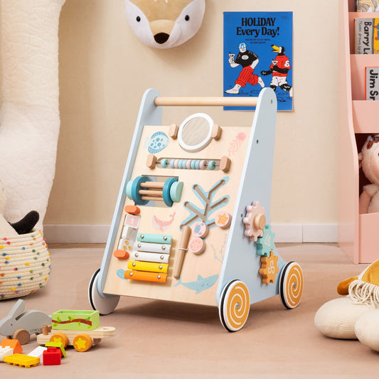 The blue push and pull learning activity centre with wheels features a xylophone and spinning gears