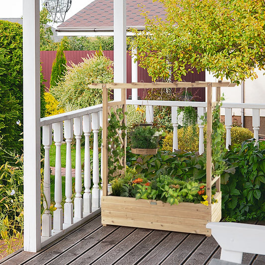 The raised garden bed with arch trellis positioned on a wooden porch deck