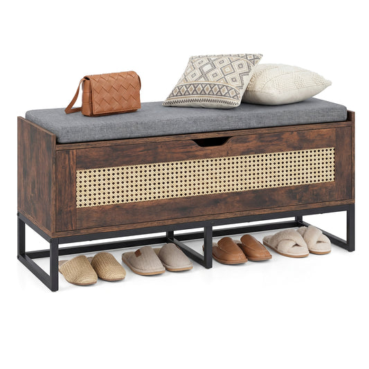 Rattan storage chest wicker shoe bench with padded seat showing the rustic brown unit with grey cushion and rattan front