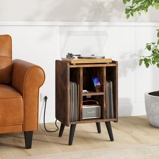 The record player stand in a living room with a record player on top and vinyl records inside
