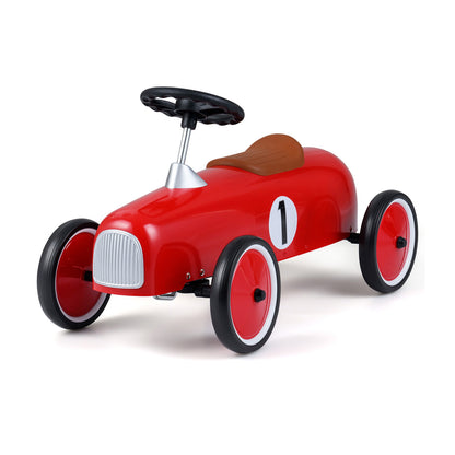 The red riding toy shown from a front angle with a brown seat and number one on the side