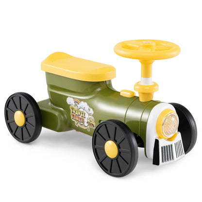Green push car train with yellow steering wheel and seat, black wheels
