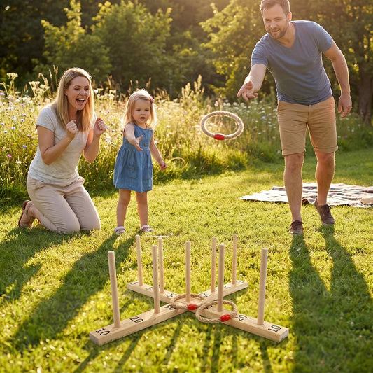 A family playing the wooden ring toss game on a sunny lawn, with the daughter throwing a ring