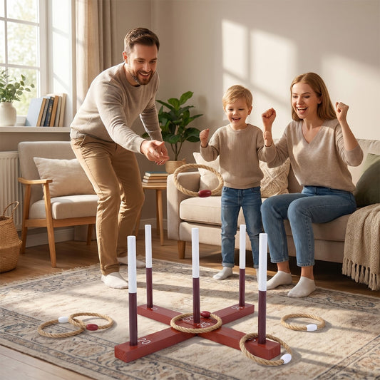 A family playing the ring toss game indoors in a living room