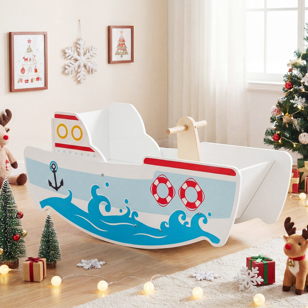 The wooden rocking ship toy with nautical theme is placed in a room with a Christmas tree