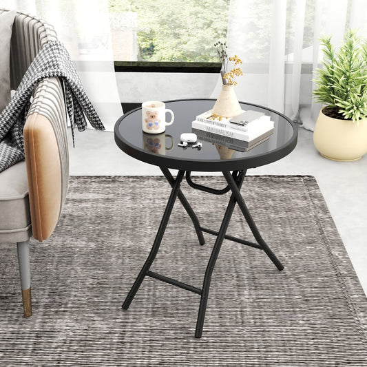 The patio table in a living room setting with a mug and books on top