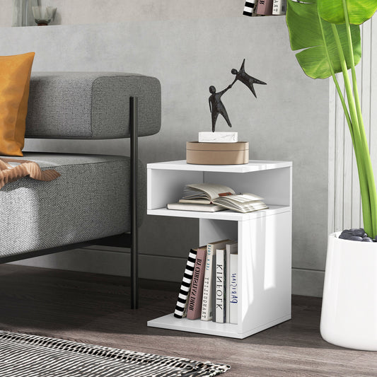 White side table with books and ornaments in a living room setting