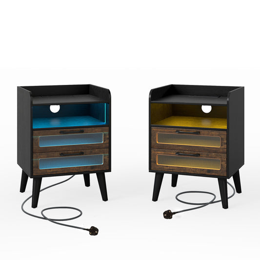 Two black bedside tables with different coloured internal lights