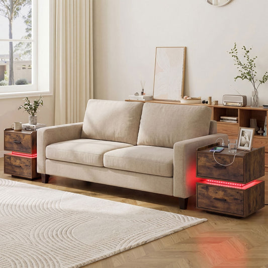 Two rustic brown nightstands with charging stations and LED lights in a living room setting