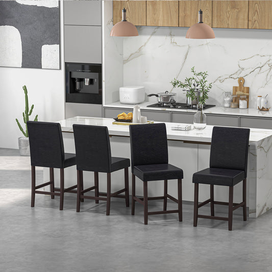 Four counter height bar stools arranged at a kitchen island