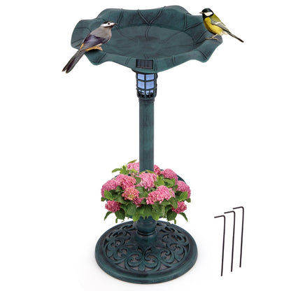 Bird bath and feeder set with two birds, a flower pot at the base and three ground stakes
