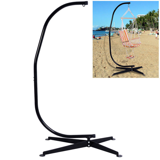 The hammock stand is shown on a beach with a striped hammock chair hanging from it