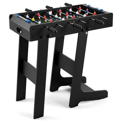 Space Saving Table Football with black legs and green pitch on a white background