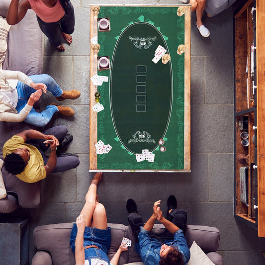 the poker table mat in use with people playing cards around it